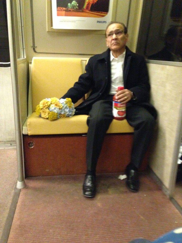 On my way home. Across from me, the embodiment of moroseness clutching a bouquet of fading flowers and an extra large container of tomato juice. And he descended at the Pentagon metro stop at 9:30PM.  Mr. Banville was correct, humans really are the strangest creatures. 