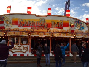 A carousel bar-- Christmas is saved! Note the girl in blue holding her hand up Breakfast Club style as she triumphantly leads the way in. Saturday detention never sounded so good.